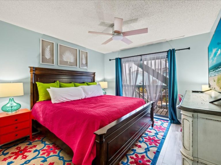 King bedroom at The Blue Palm at Lani Kai Gulf Shores condo