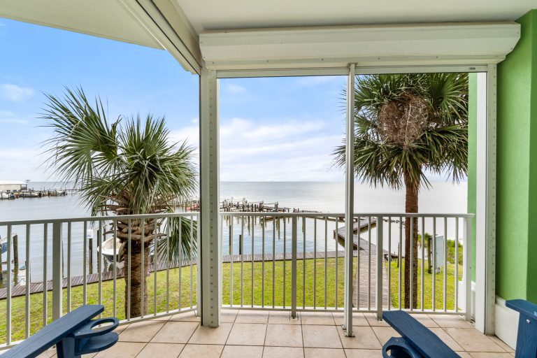 Mobile Bay view from the living room balcony at Navy Cove Retreat